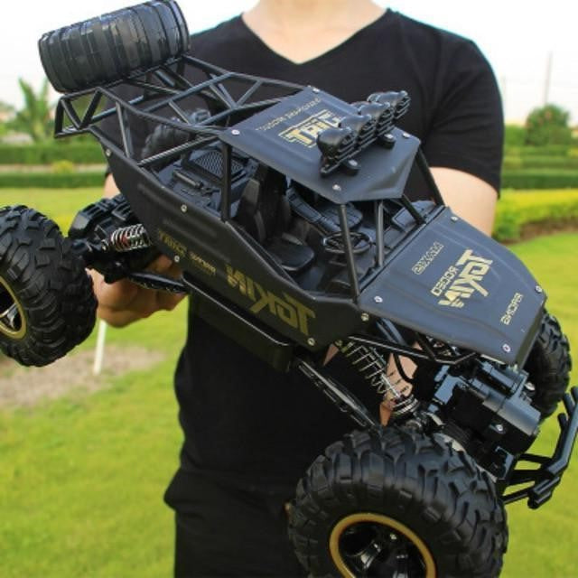 RC Monster Truck 1:12 Offroad mit Stoßdämpfern, 2.4GHz, 15 km/h, Gummireifen, 50 m Reichweite