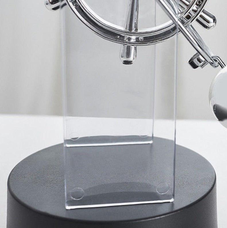 Rotierendes Perpetuum Mobile-Pendel - Dekoratives Ornament
