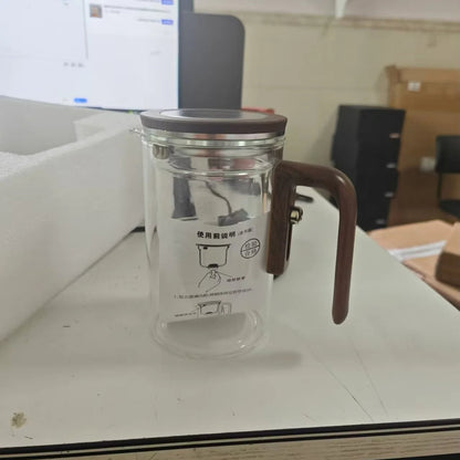 Glas Teekanne mit Holzgriff