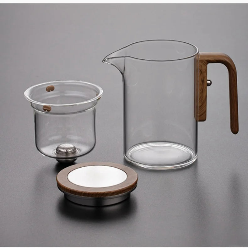 Glas Teekanne mit Holzgriff
