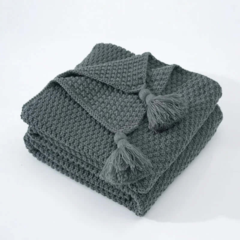 Kuschelige Strickdecke mit Fransen - Wohndecke aus weicher Wolle
