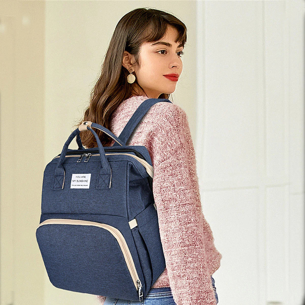 Zelara - 2in1 Baby Rucksack mit integriertem Wickelbett wählen