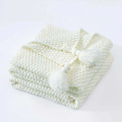 Kuschelige Strickdecke mit Fransen - Wohndecke aus weicher Wolle