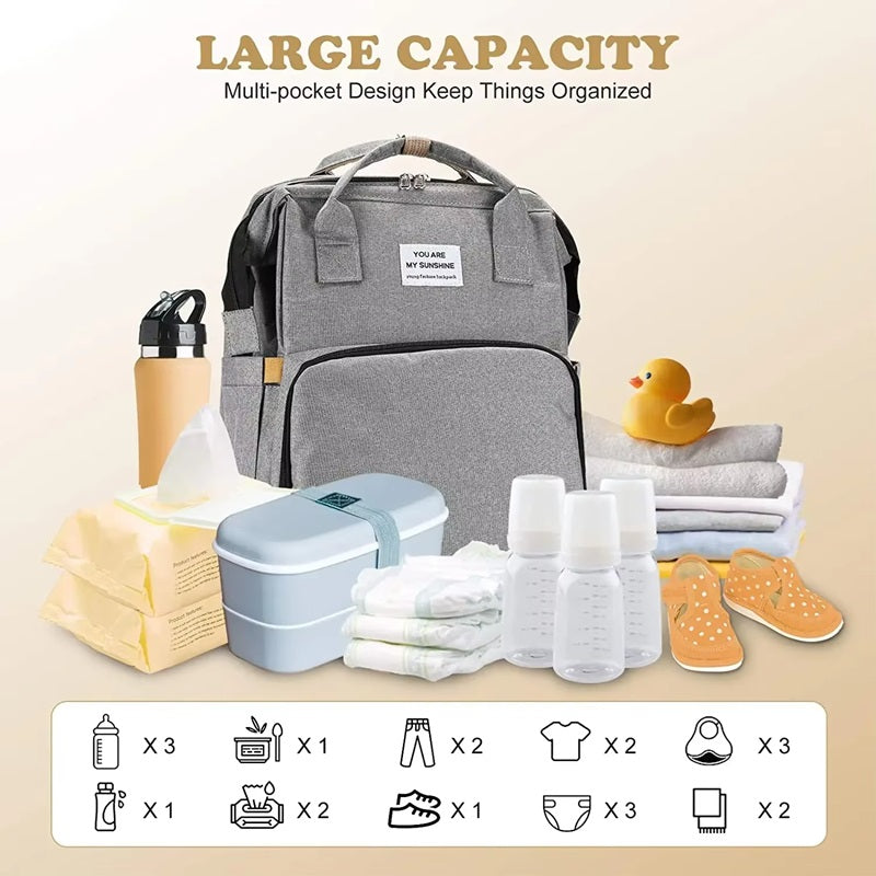 Multifunktionale Wickeltasche mit faltbarem Babybett und Wickelauflage